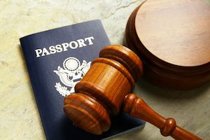 US passport and judges court gavel, from above