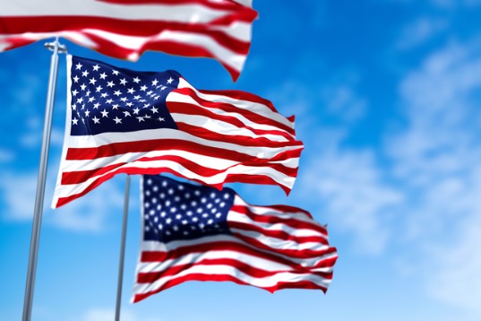 three flags of the united states of america waving in the wind.jpg s1024x1024wisk20cCPQcEKGBHRXvHrxE3ZNF9